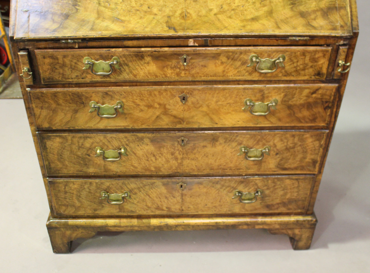 A George I walnut bureau with feather banded borders, the fall-flap enclosing a fitted interior, - Image 5 of 5