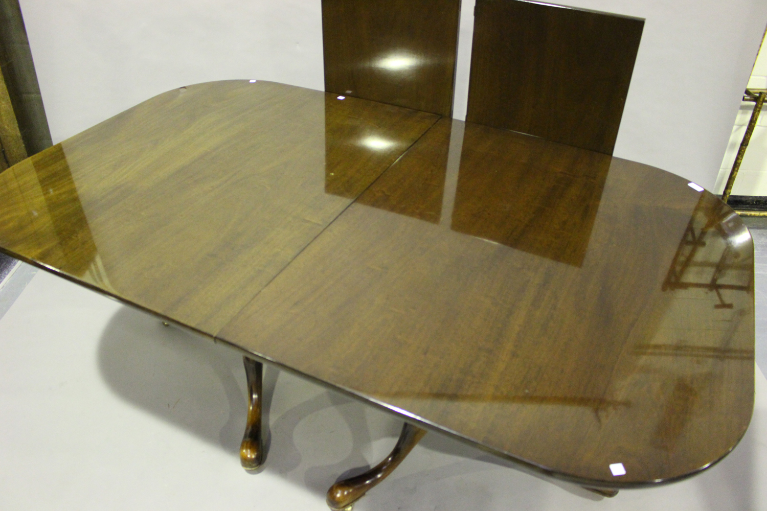 A late 20th century George III style mahogany twin-pedestal dining table, the top with two extra - Image 3 of 3