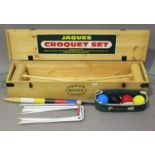 A 20th century croquet set by Jaques, London, within its original pine case.Buyer’s Premium 29.4% (