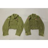A group of 20th century British and European military uniform and related items, including two