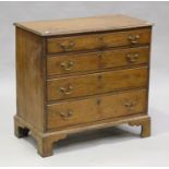 A George III oak chest of four graduated long drawers, on bracket feet, height 85cm, width 88cm,