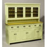 A modern Victorian style pine and cream painted kitchen dresser, height 182cm, width 180cm, depth
