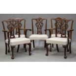 A set of ten 20th century George III style mahogany dining chairs, the finely carved pierced splat