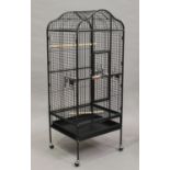 A modern unused Victorian style galvanized metal parrot cage, the arched top with hinged door