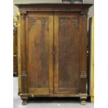 A 19th century Canadian mahogany armoire, New Brunswick, height 223cm, width 170cm (faults).