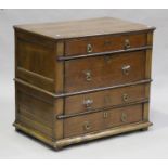 A Queen Anne oak chest of four long drawers, on stile supports, height 81cm, width 89cm, depth