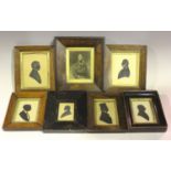 A group of nine mainly 19th century silhouette miniature portraits, all within period frames,