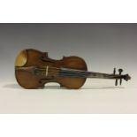 A violin, the interior bearing repairer's label inscribed 'Restored by William G. Geary London