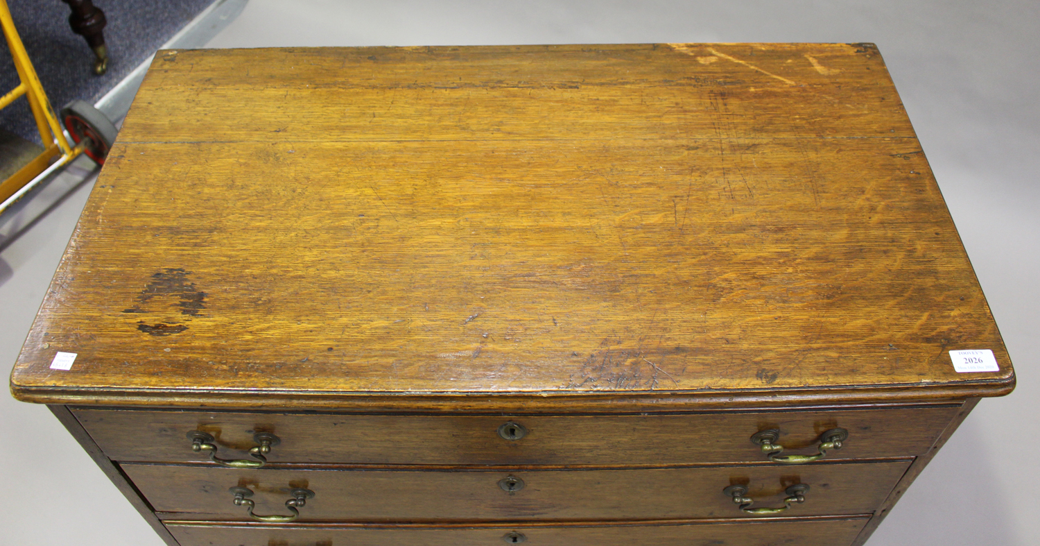 A George III oak chest of four graduated long drawers, on bracket feet, height 85cm, width 88cm, - Image 5 of 5