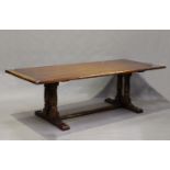 A modern Jacobean Revival oak refectory dining table by the Royal Oak Furniture Company, the seven-