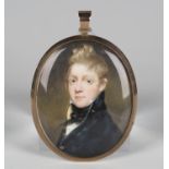 Attributed to John Commerford - a 19th century watercolour on ivory oval miniature portrait of a