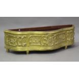 A 20th century gilt painted softwood window planter of serpentine fronted form, carved with