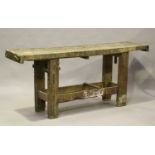 An early 20th century wooden work bench, height 86cm, length 201cm, depth 47cm.Buyer’s Premium 29.4%