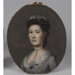 A 19th century North European oil on board miniature portrait of a lady, 9.5cm x 8cm, mounted within