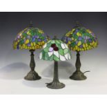 A pair of modern Tiffany style table lamps with leaded and stained glass shades, height 48cm,