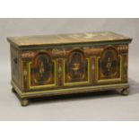 An early/mid-20th century Continental painted pine trunk, the panelled front inscribed and dated,