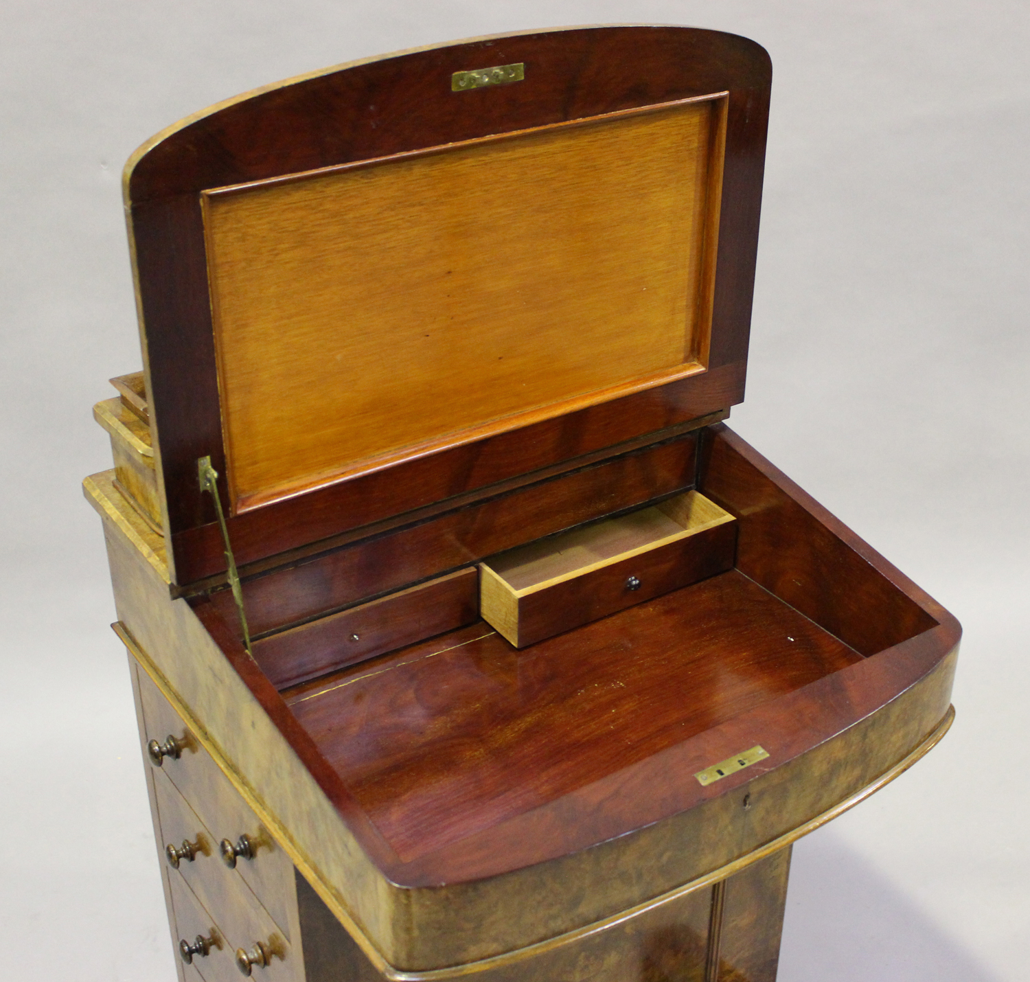 A late Victorian burr walnut Davenport, fitted with a hinged pen compartment and writing slope above - Image 7 of 8