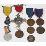 A group of mostly French medallions, including a silver rectangular medallion, detailed 'Cambridge &
