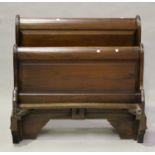 A late 20th century stained hardwood double sleigh bed with typically curved ends, height 97cm,