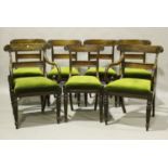 A set of seven William IV mahogany bar back dining chairs, comprising a pair of carvers and five