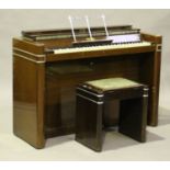 An Art Deco mahogany and metal mounted Eavestaff Pianette 'Minipiano', height 85cm, width 130cm,