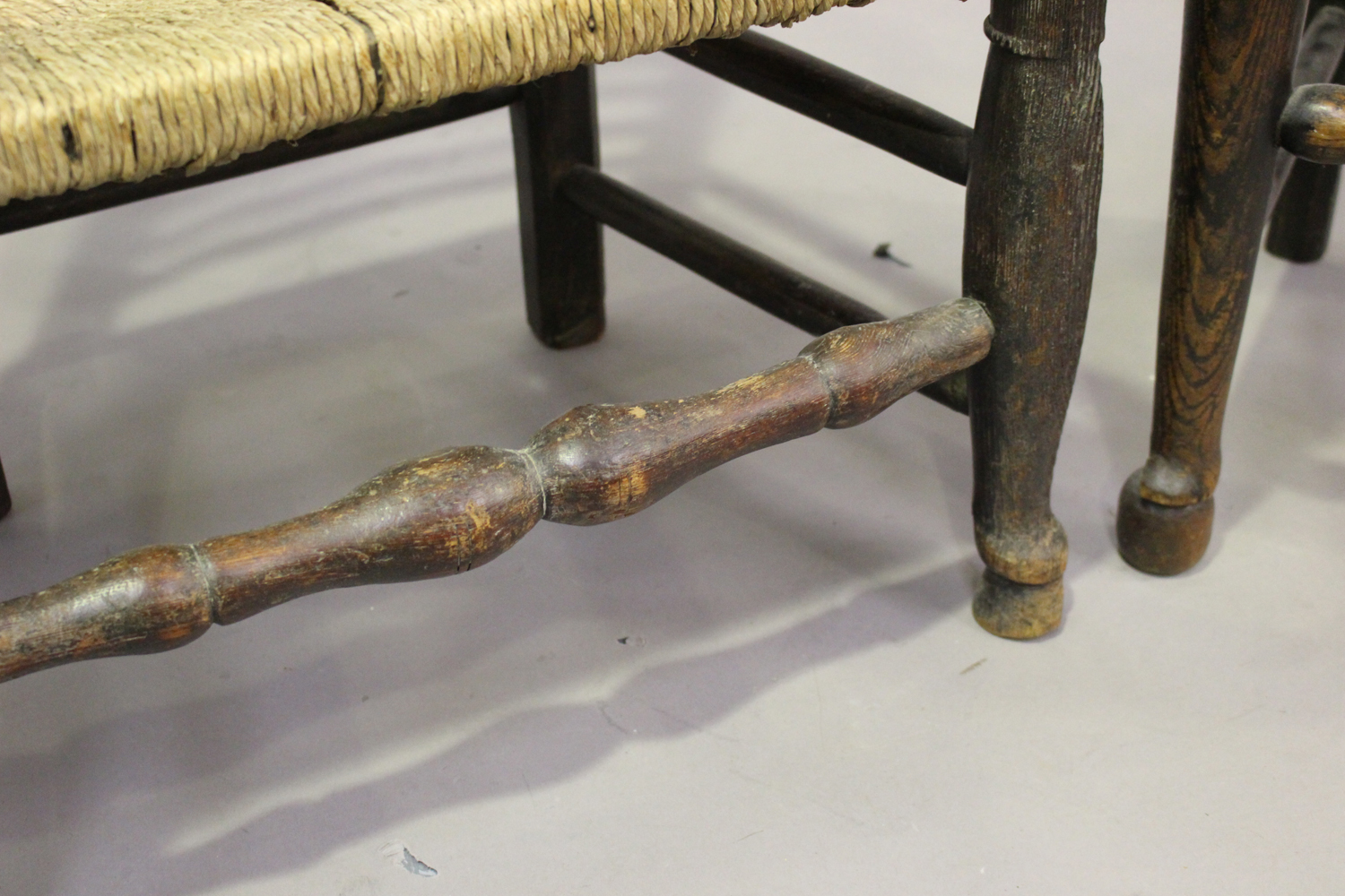 A 19th century ash and yew ladder back elbow chair with rush seat, height 97cm, width 52cm, together - Image 3 of 4