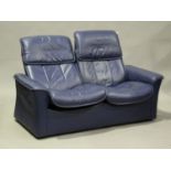 A modern Stressless blue leather two-seat sofa by Ekornes, height 98cm, width 163cm, depth 77cm.