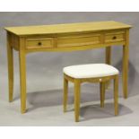 A modern solid oak bowfront dressing table by Marks & Spencer, height 80cm, width 128cm, depth 50cm,