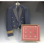 A post-Second World War R.A.F. officer's mess jacket and waistcoat, the labels detailed 'Specially