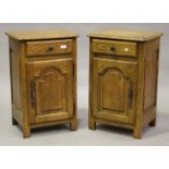 A pair of late 20th century French provincial oak bedside cabinets by De Tonge, height 70cm, width
