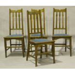 A set of Edwardian Arts and Crafts Glasgow School oak framed dining chairs, probably designed by E.