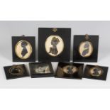 A group of four 19th century cut paper silhouette portraits, some heightened in gilt, together