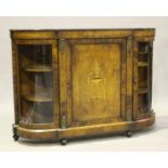 A late Victorian walnut and boxwood inlaid credenza with bowed glass side cabinets, height 106cm,