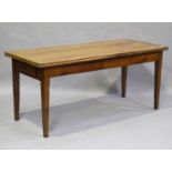 A 19th century French cherry drawleaf farmhouse table, fitted with a single end drawer, height 77cm,