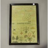 A Victorian needlework sampler, worked in coloured threads with bands of numbers and letters above a