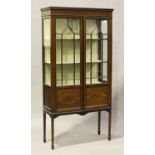 An Edwardian mahogany and boxwood inlaid display cabinet, height 172cm, width 88cm, depth 33cm.