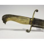 An early 19th century naval midshipman's dirk with curved foliate engraved blade, blade length 40cm,