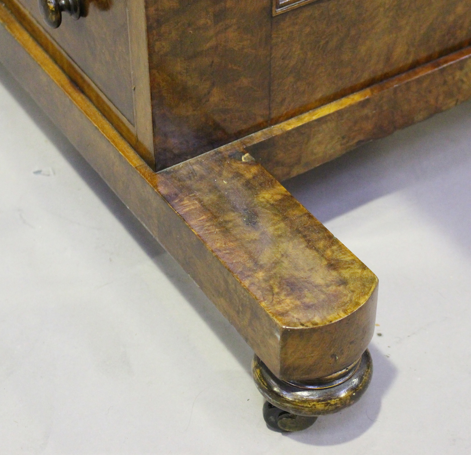 A late Victorian burr walnut Davenport, fitted with a hinged pen compartment and writing slope above - Image 4 of 8