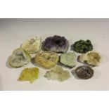 A selection of ten mineral specimens, including quartz geodes, amethyst and other various quartz