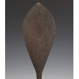 A 19th century Polynesian carved and patinated wooden ceremonial paddle, Austral Islands, South