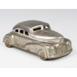 An Art Deco nickel plated box of automobile form, bearing maker's stamp detailed 'Betalmotorcar