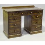 A Victorian mahogany twin-pedestal desk, fitted with an arrangement of eight drawers, height 80cm,