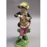 A Bloor Derby figure of a boy with a posy of flowers, emblematic of 'Spring' from a set of the