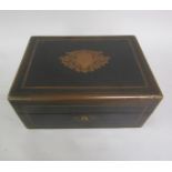 A Victorian ebonised travelling box, brass line inlaid with side flush fitting carrying handles. The