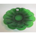 An 18c/19c green Chinese Beijing floraform glass dish, 31cm diam.