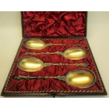 A set of four Victorian silver plated apostle table spoons in original silk lined box, each 19cm l.