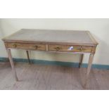 A 19c French limed ash two drawer side table of rectangular form with rounded corners, having a
