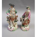 A pair of Derby figures of Huntsman and Huntswoman, a/f, 17cm h.