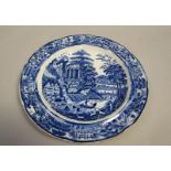 A Leeds pottery pearlware plate transfer printed in blue and white with a Continental scene,