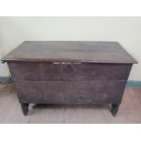 A late 17c oak coffer, 103cm w, 67cm h.